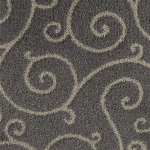 The clean and graceful lines of Traces accentuate the movement in this updated yet classic scroll design.